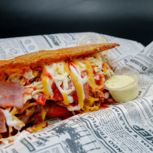 Patacón pollo desmechado